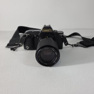 Canon T70 35mm Manual SLR Film Camera W/ RMC Tokina 75-150mm 1:3.8 Lens - Read